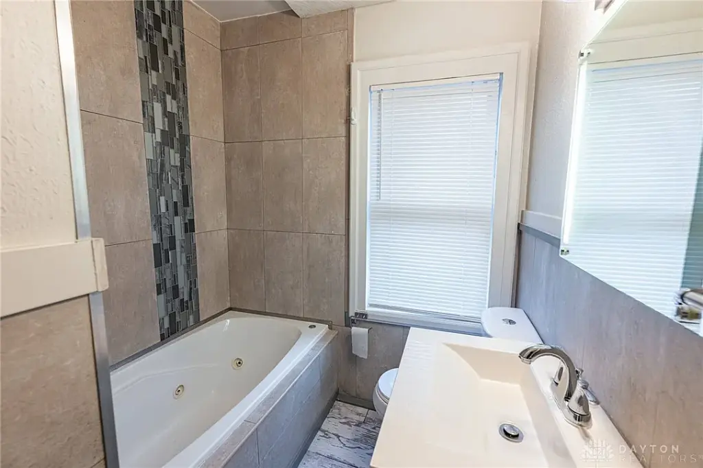 Updated Home with Dining Room, Nice Deck, and Modern Touches With $5k Reduction