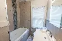Updated Home with Dining Room, Nice Deck, and Modern Touches With $5k Reduction