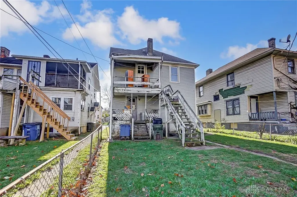 Investor’s Dream – Tenant-Occupied Duplex with Vinyl Siding, Newer Roof, Detached Garage and Ready for TLC