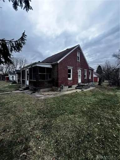 Freshly Painted Brick Home Featuring Updated Kitchen and Bath with LVP Flooring